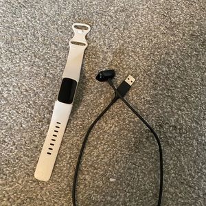 Fitbit charge 5 cream band with gold face